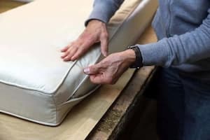 Cushion fabricator making an outdoor cushion