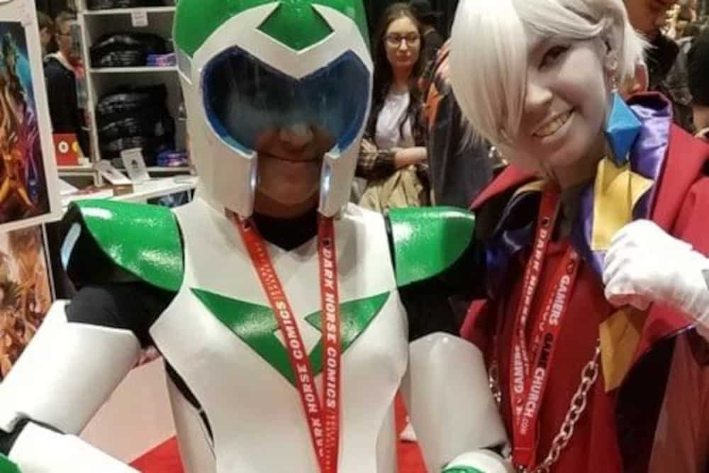 Two cosplayers wearing DIY costumes
