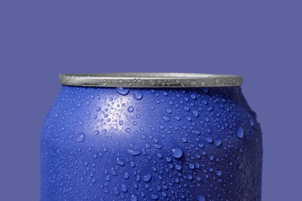 An aluminum can with water condensation.