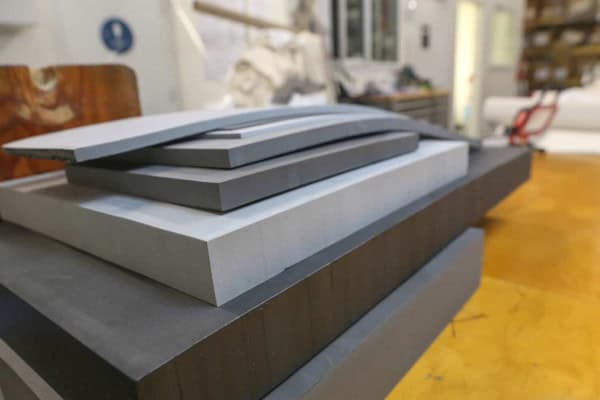 Stack of different colored EVA foam on table