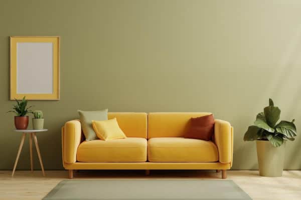 A picture containing living, sofa, wall, indoor