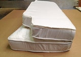 Boat mattress with a quilted top hinge folded in half