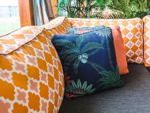 Orange and Blue Cushions on Couch