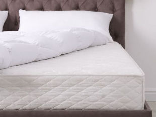 Brown Bed with White Mattress and Pillows