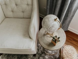 Overhead image of arm chair showcasing T-shape cushion