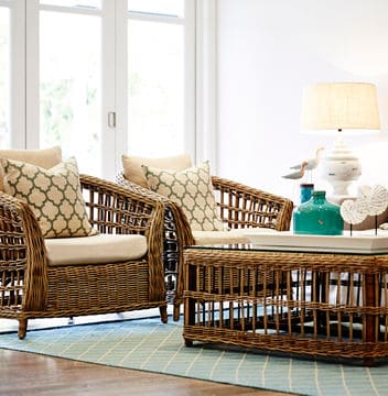 Wooden Couch and table with patterned cushions