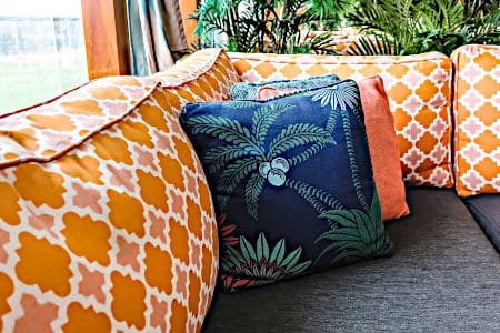 Orange and Blue Cushions on Couch